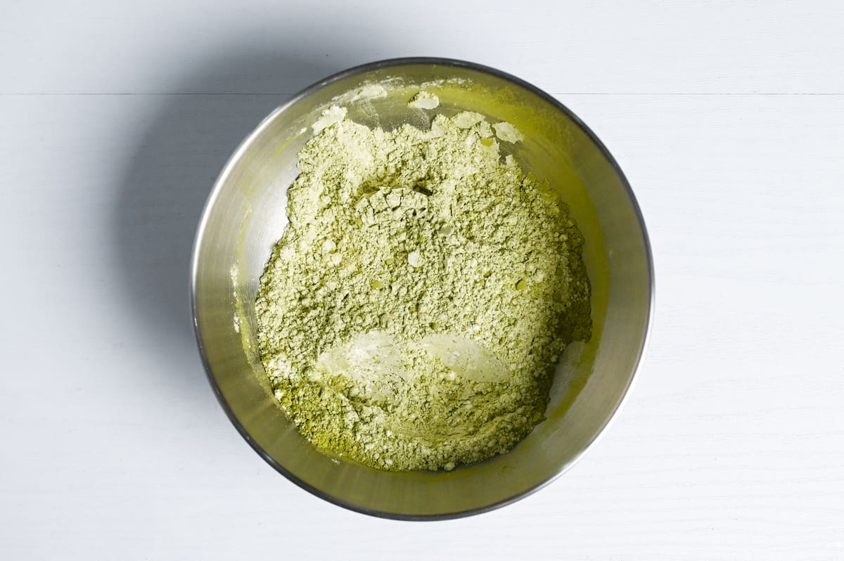 matcha powder and flour in a mixing bowl