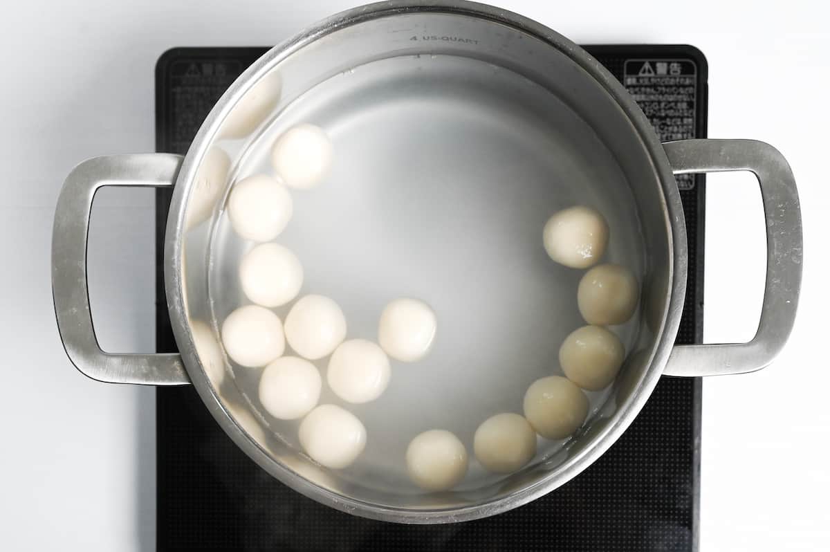 dango floating in boiling water