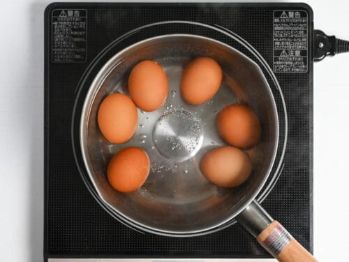 boiling eggs in a saucepan