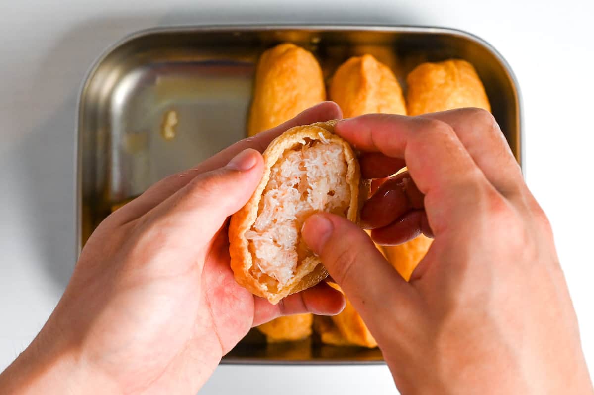 adding canned shredded crab to inarizushi