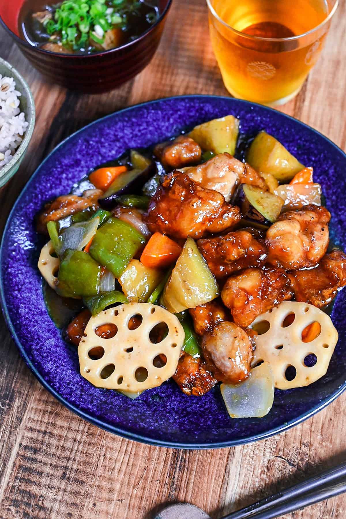 Ootoya style tori to yasai no kurozu an (Japanese black vinegar sweet and sour chicken and vegetables) on a blue plate