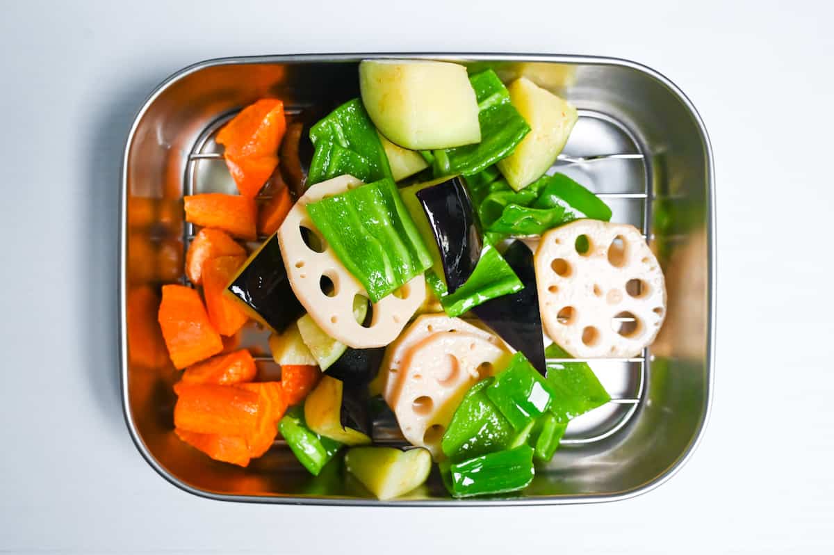 draining shallow fried vegetables on a wire rack