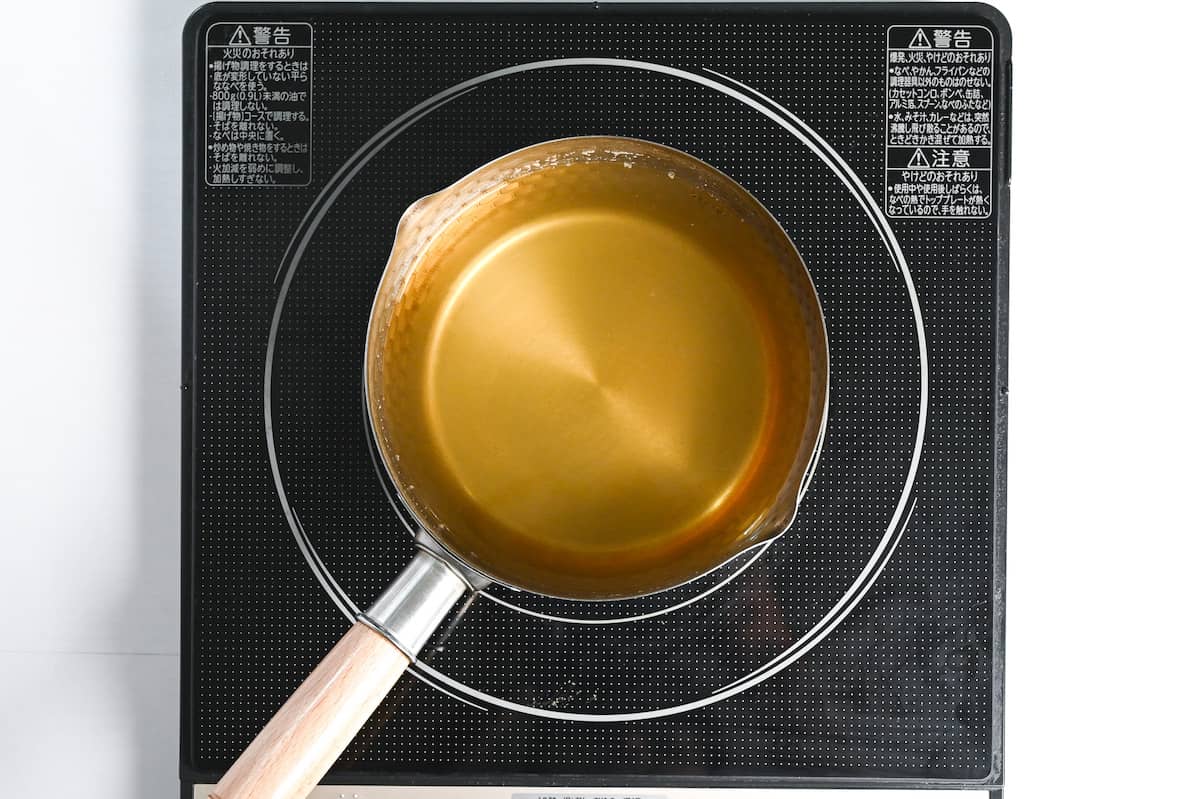 Dashi in a saucepan on a stove