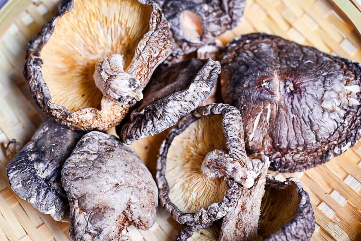 dried shiitake mushrooms on a bamboo zaru (tray)