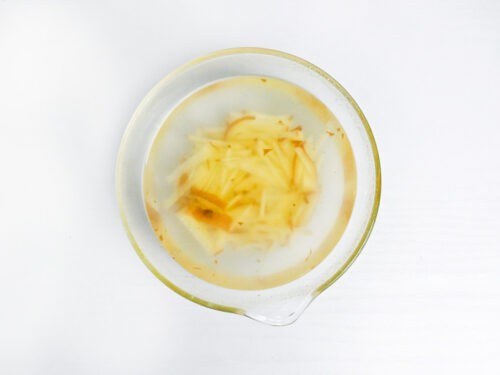 soaking peeled and julienned ginger in a glass bowl of cold water
