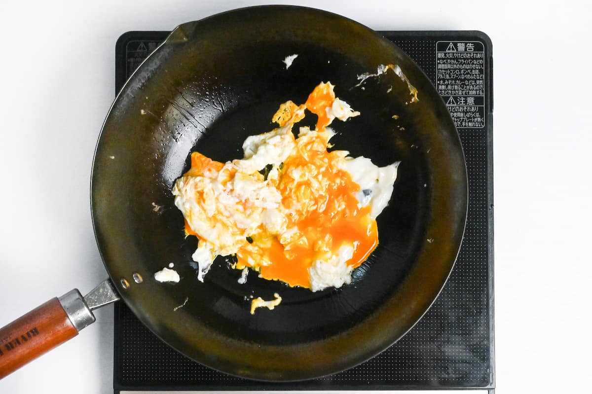 fried egg in a wok
