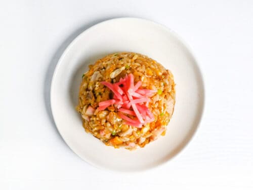 chahan topped with benishoga (pink pickled ginger)