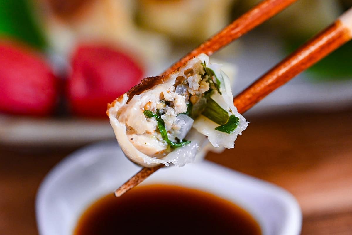 inside chicken gyoza flavored with umeboshi and perilla leaves