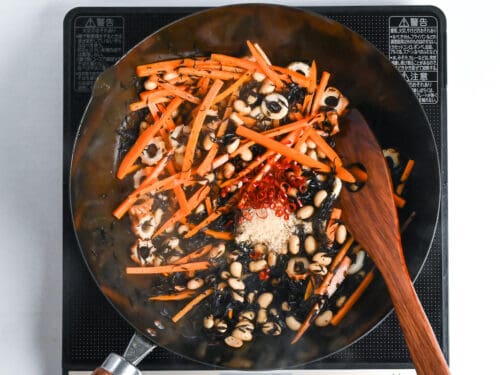 stir fried carrot, hijiki, chikuwa and soy beans with condiments and chopped dry chili
