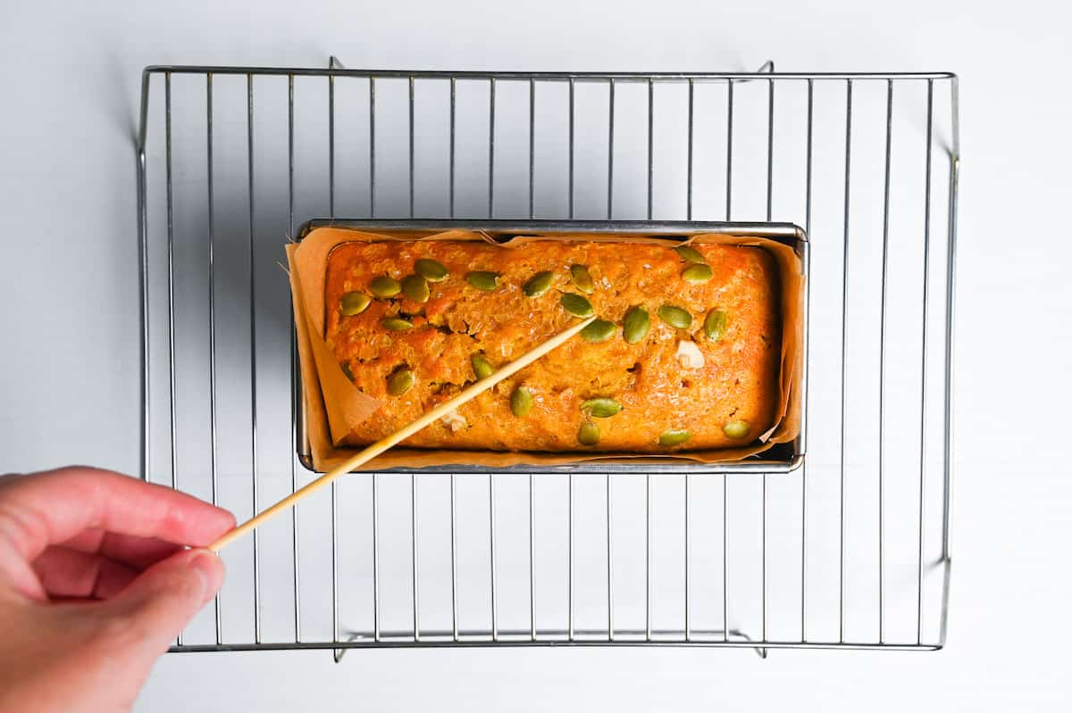 bamboo skewer coming out clean from kabocha loaf