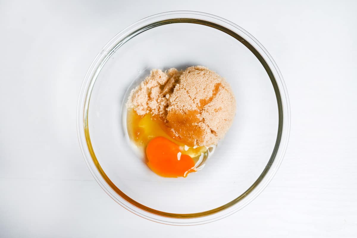 light brown sugar and egg in a bowl