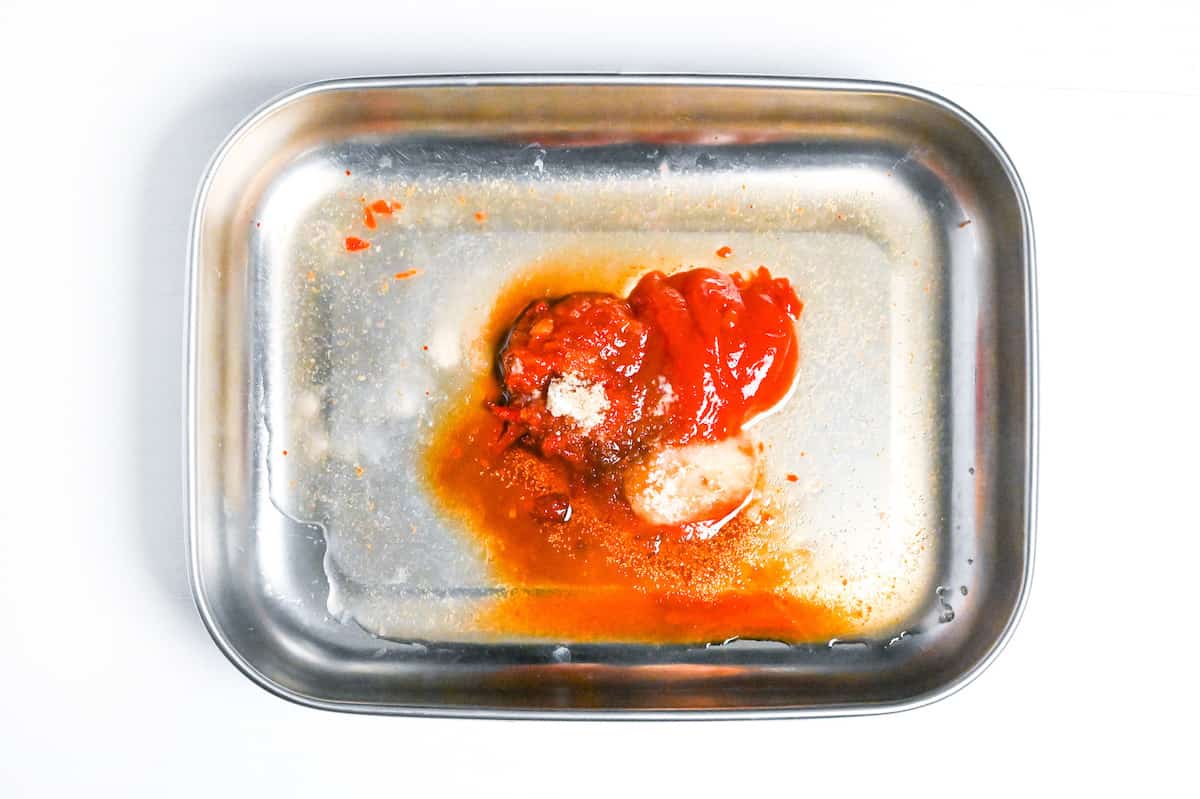 condiments in a metal tray to make marinade for karami chicken