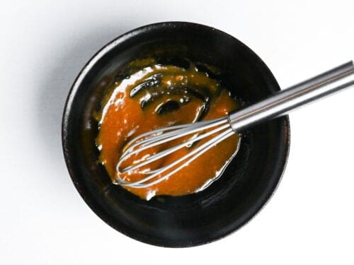 miso marinade mixed in a black bowl