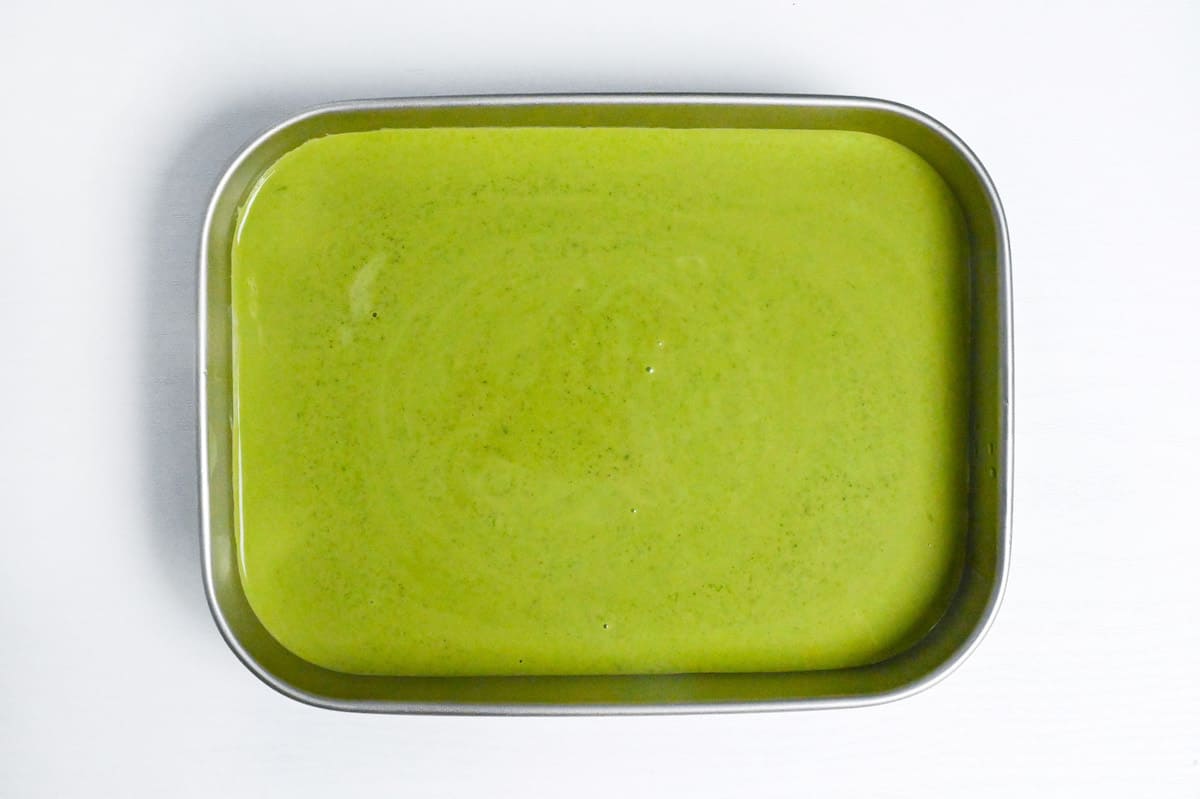 matcha ice cream in a wide metal container