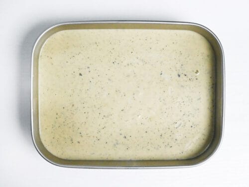 sesame ice cream mixture in a wide container