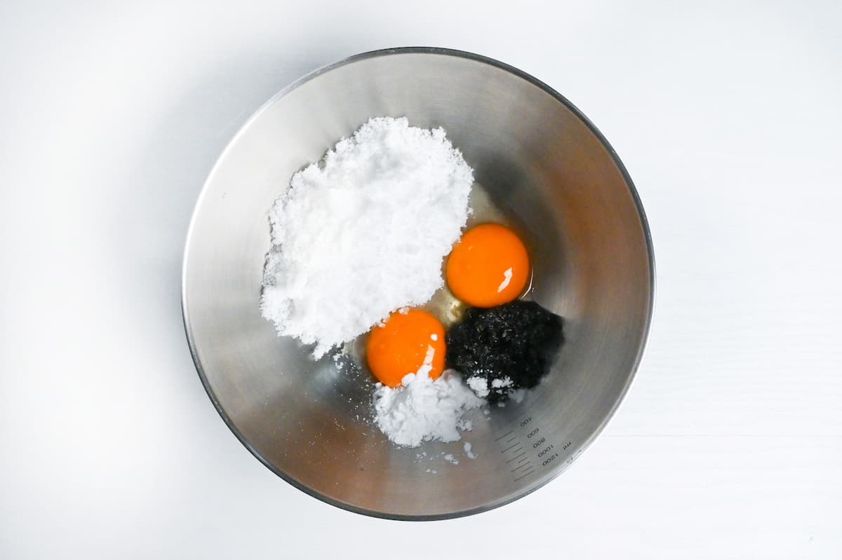 sugar, egg yolks, black sesame paste and cornstarch in a metal mixing bowl