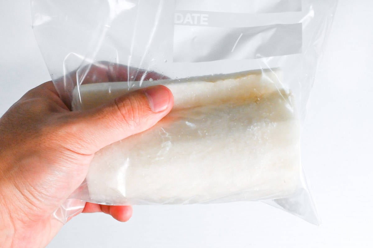 daikon radish in a sealable freezer bag with salt