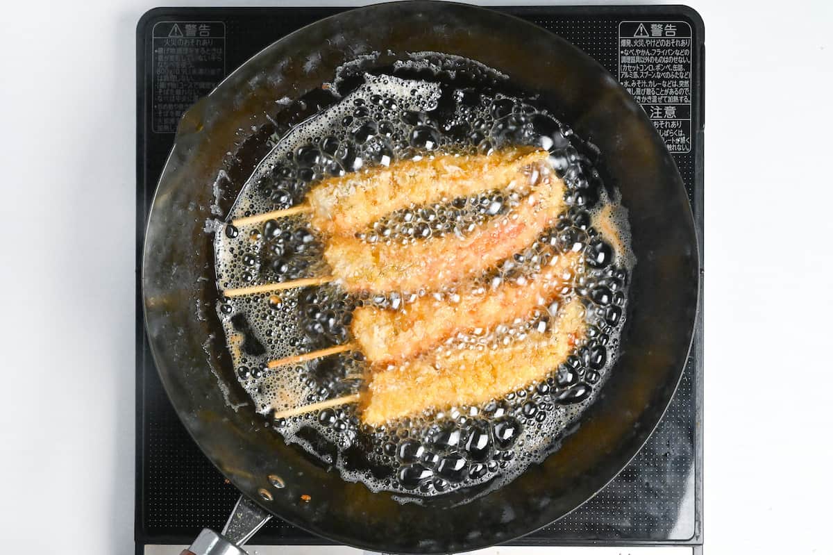 frying ebi fry in oil in a wok