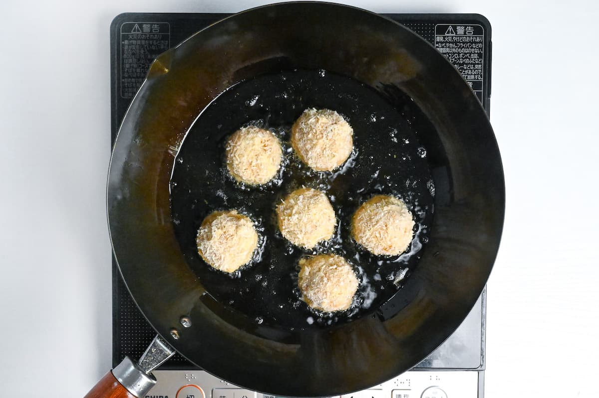 kabocha korokke frying in oil