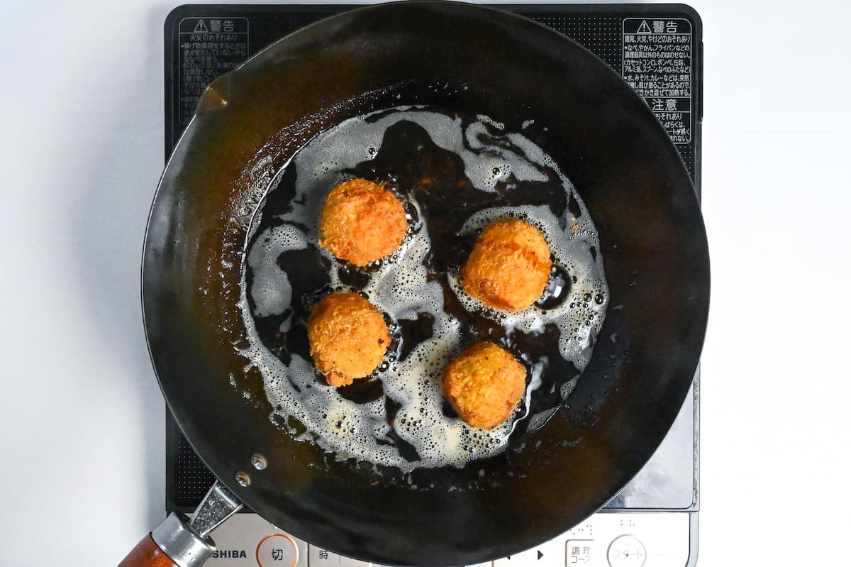 kabocha korokke frying in oil