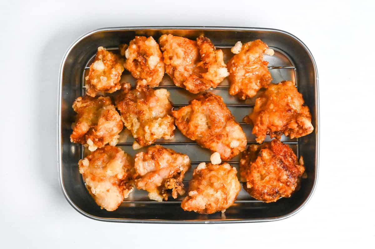 crispy fried chicken karaage on a wire rack to drain excess oil