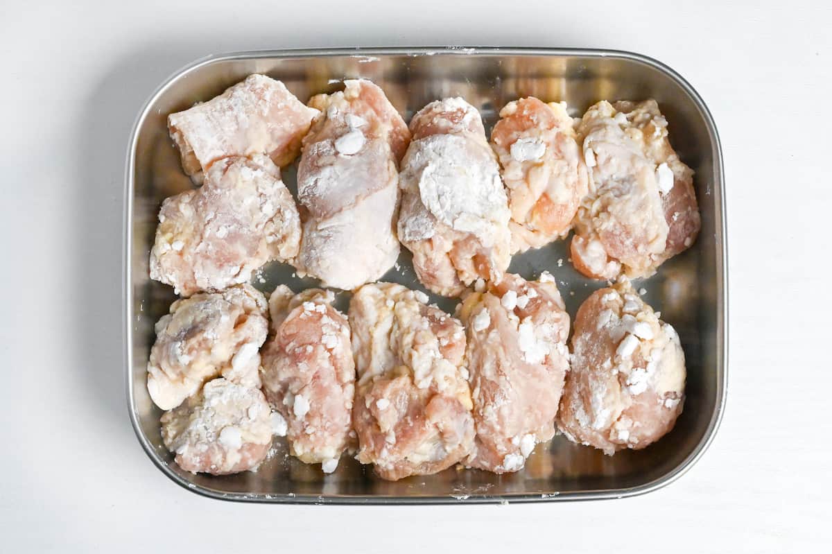 chicken thigh pieces coated in starch