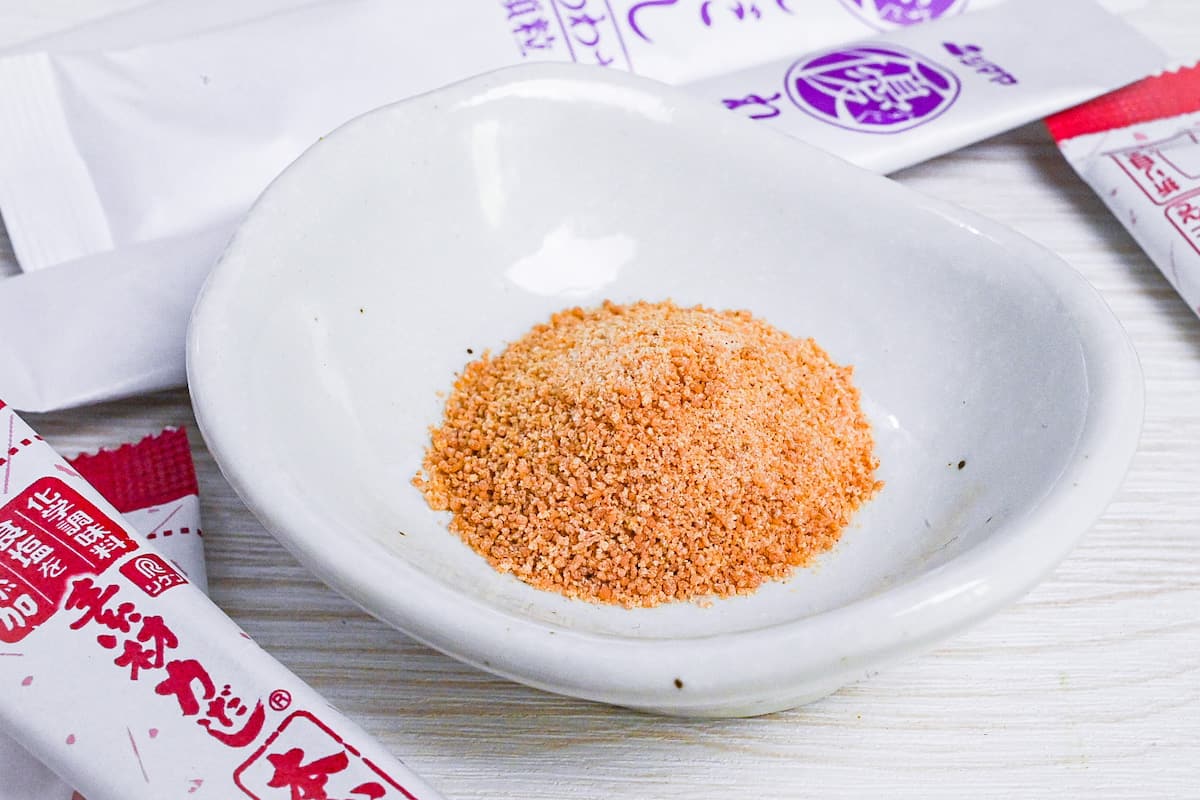 close up of dashi granules on a small white plate