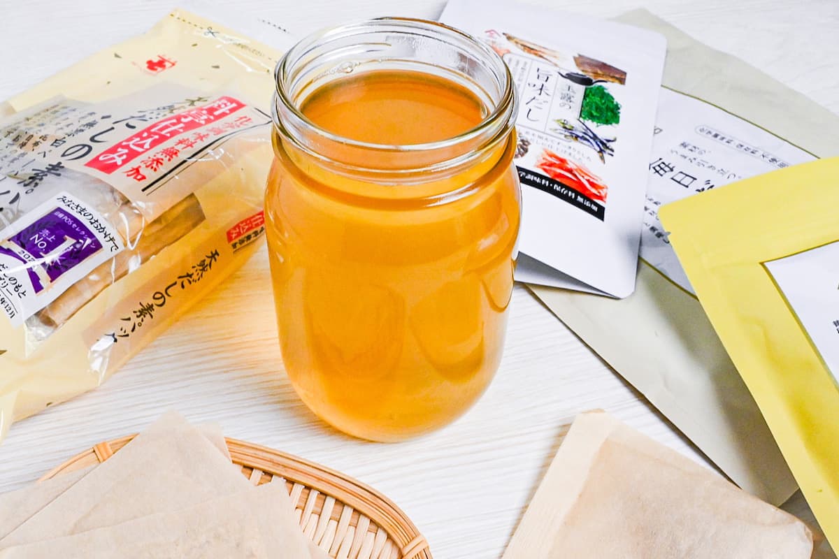 dashi made with dashi packets surrounded by bags of various brands