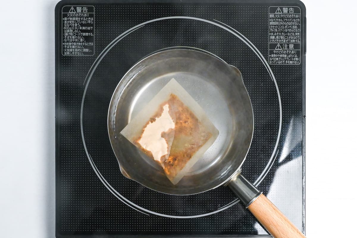 dashi bag placed in a pot of hot water