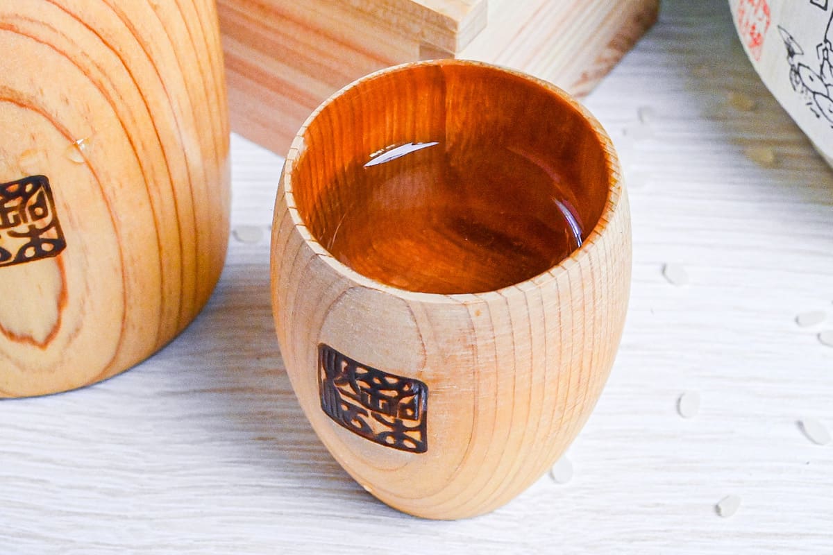 sake in a wooden sake cup