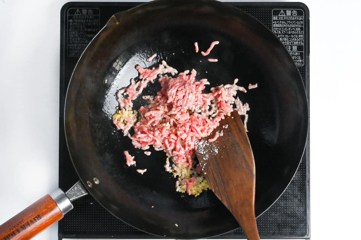 frying ground pork with salt, pepper and aromatics