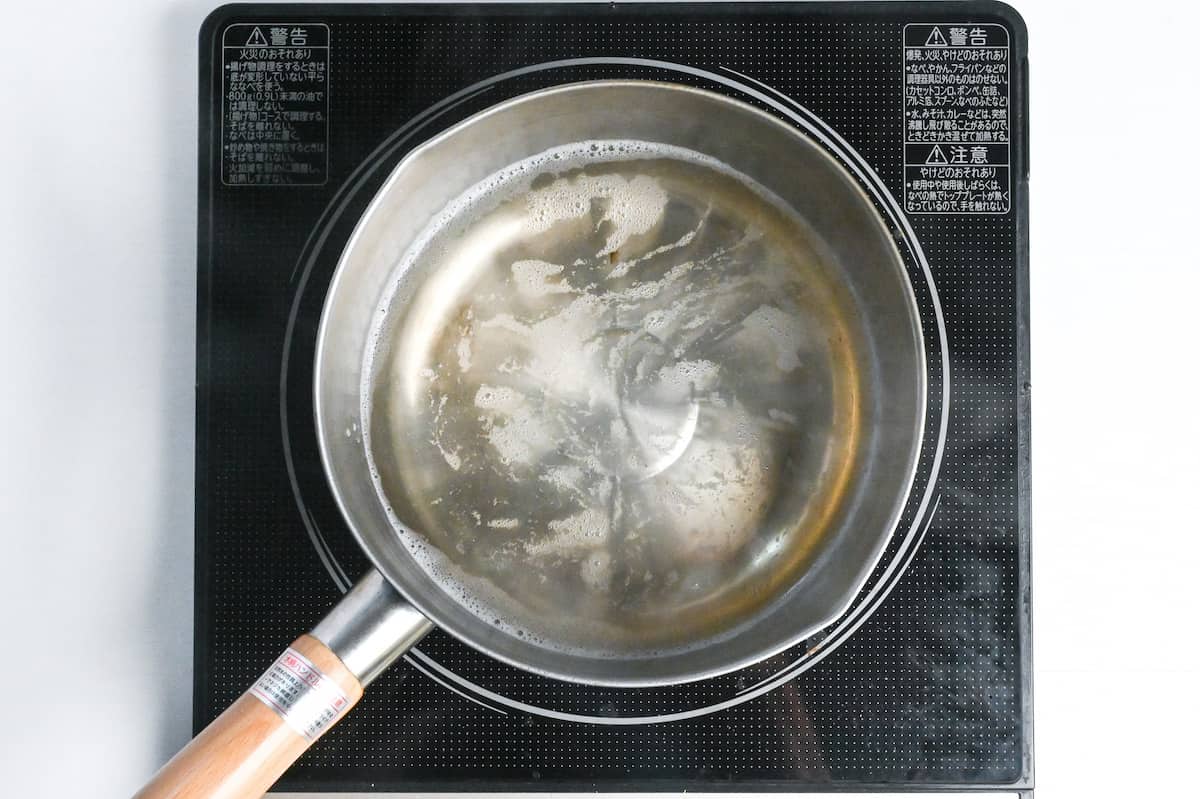 dashi stock in a pan with kombu and shiitake removed