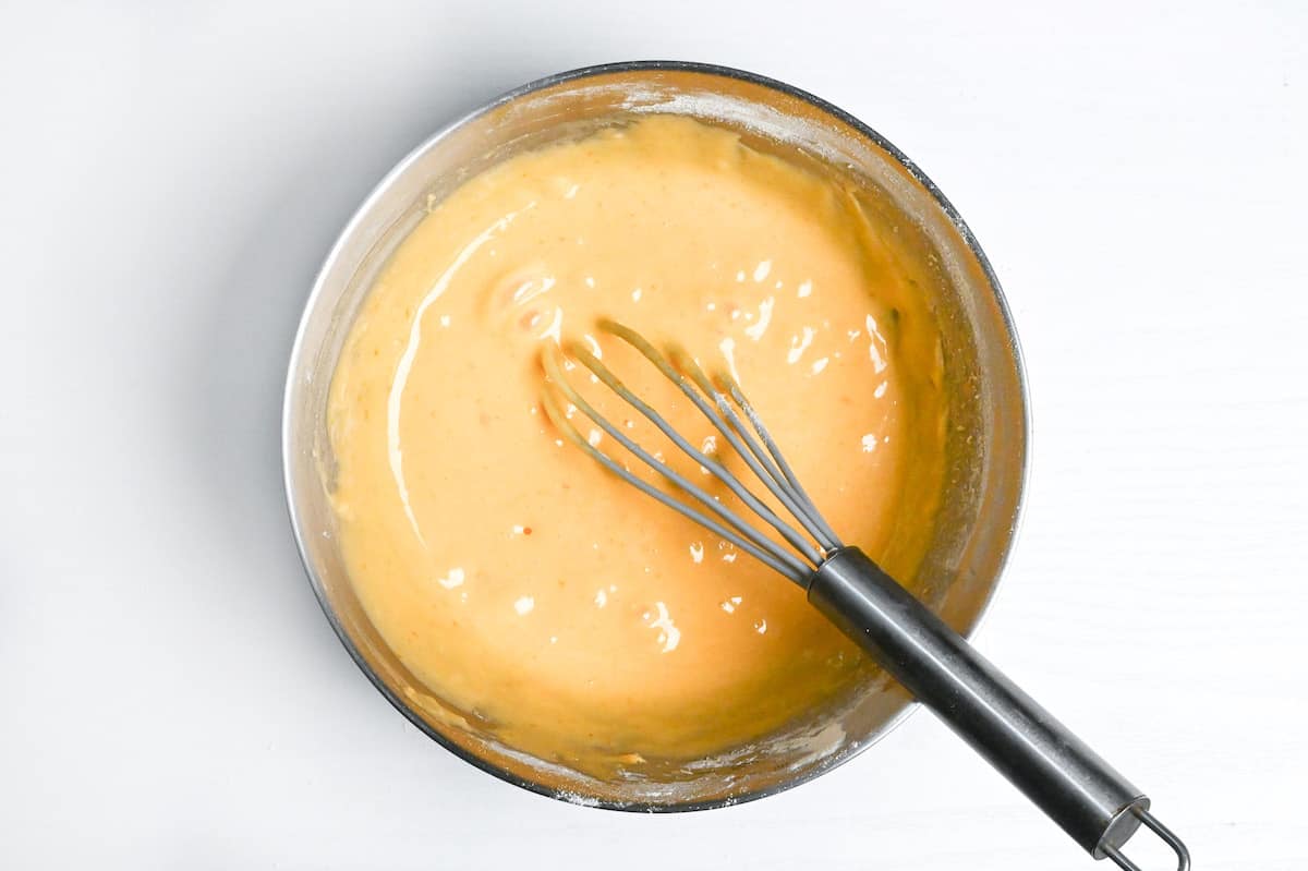 dorayaki batter whisked in a steel mixing bowl
