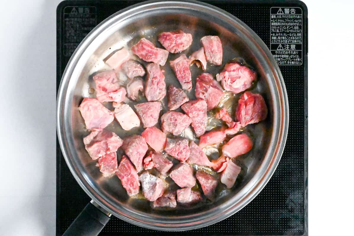 sealing beef in a pan