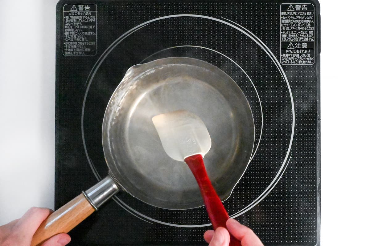 heating sweetened kanten mixture on the stove