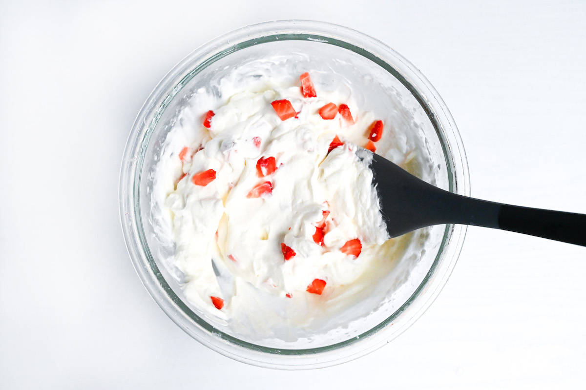 whipped cream with diced strawberries