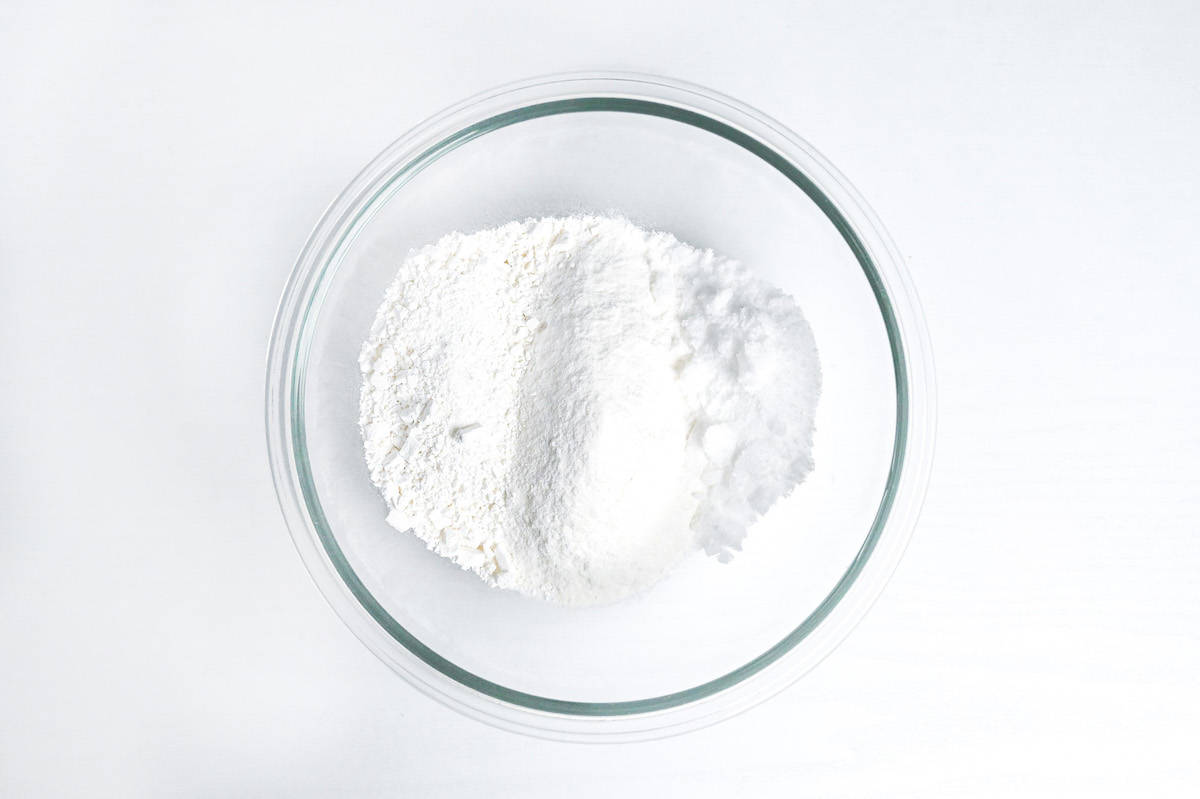 glutinous rice flour, rice flour and sugar in a glass mixing bowl