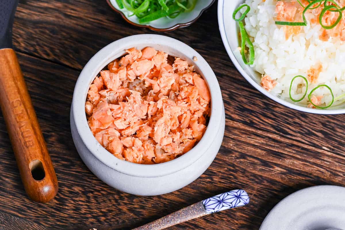 Homemade Japanese-style salmon flakes in a white ceramic pot