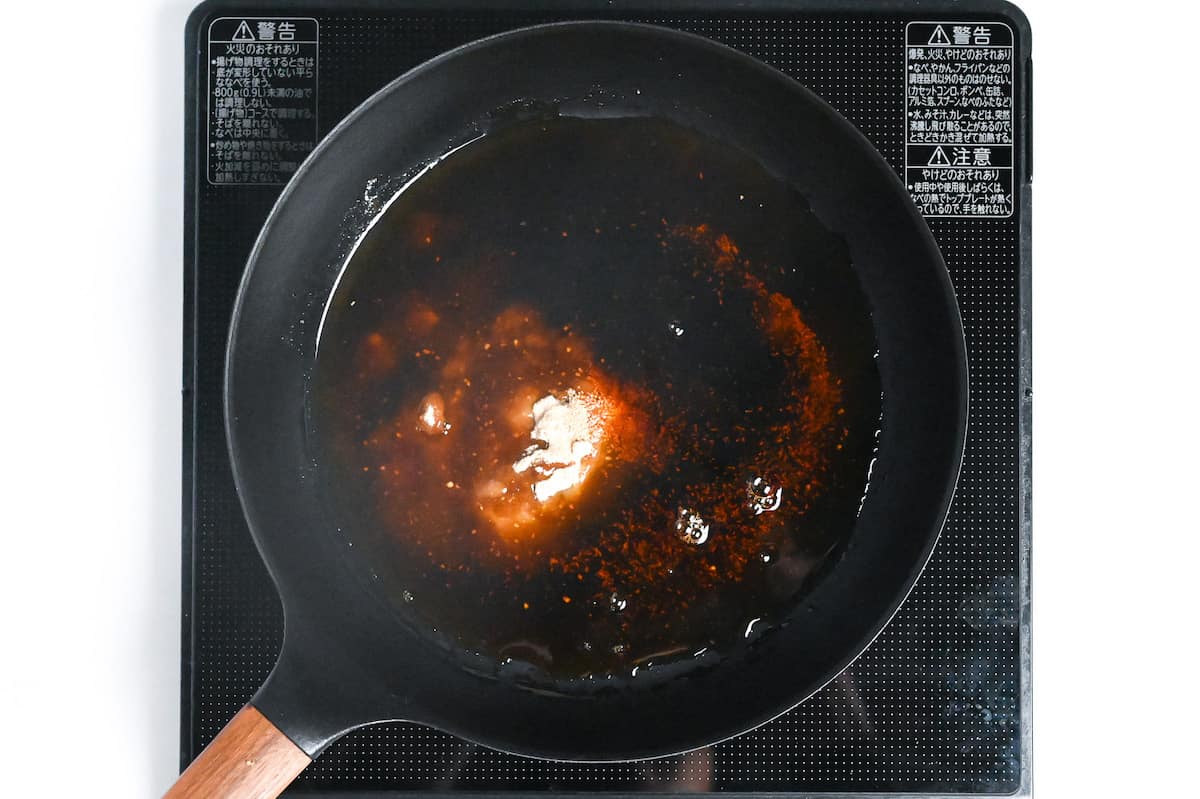 ingredients to make sukiyaki sauce in a frying pan