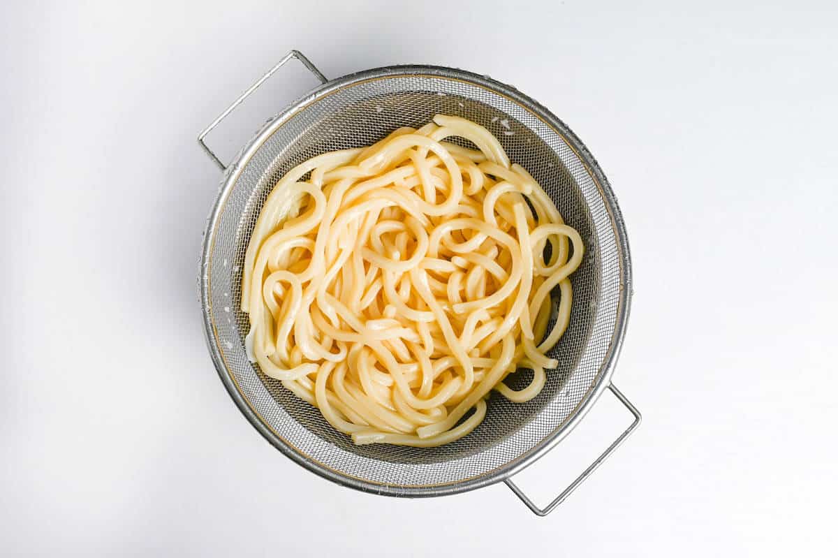 Udon noodles in Colander