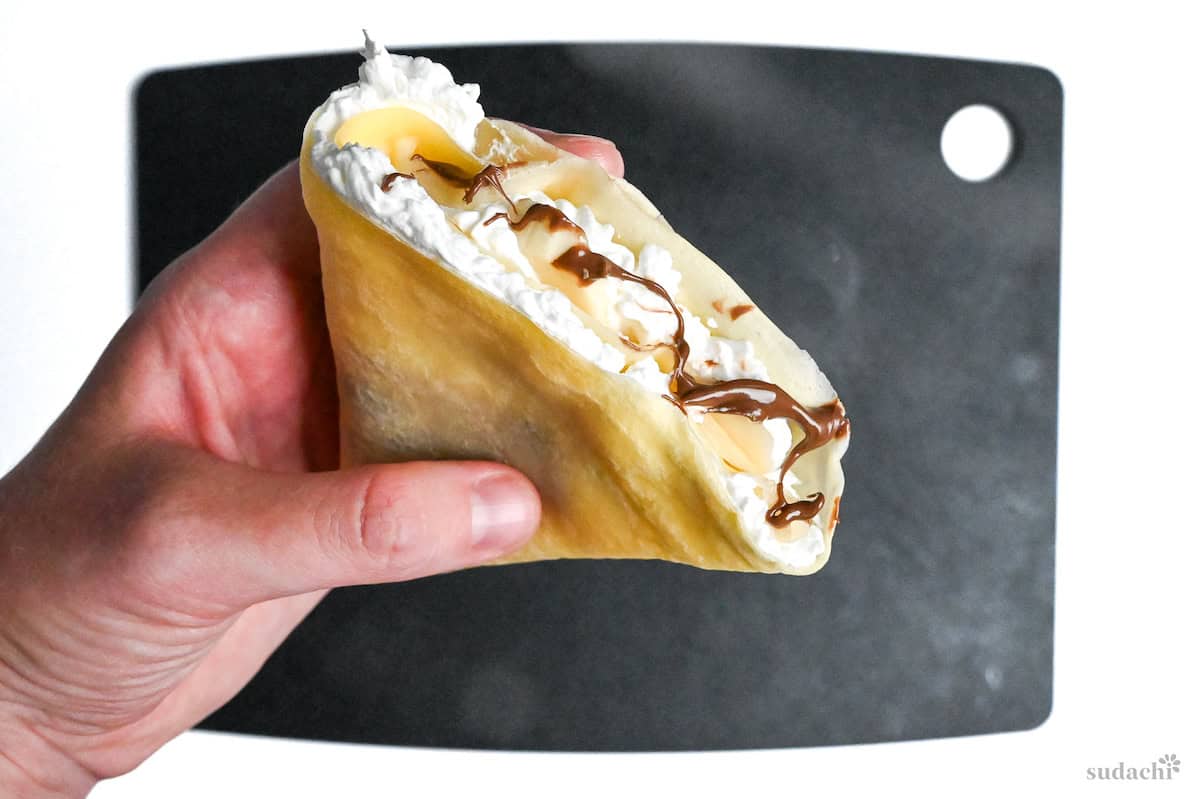 Japanese crepe filled with cream, chocolate and banana