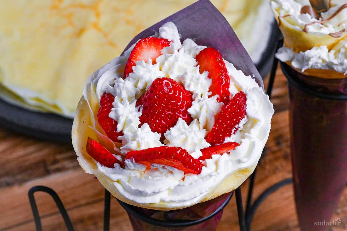 close up of strawberry and cream Japanese crepe