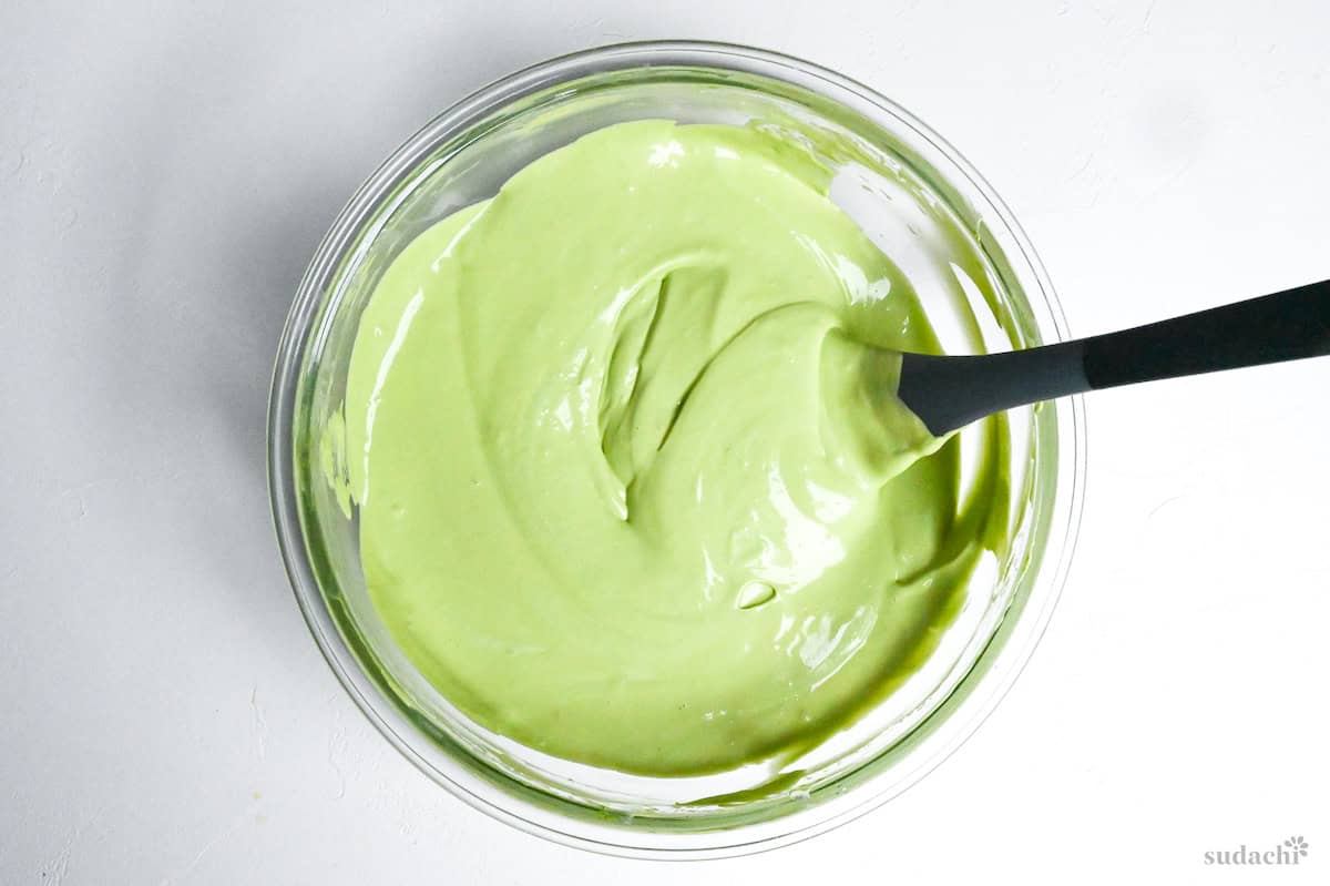 Matcha tiramisu filling in a glass bowl