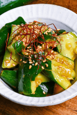 Close up of Japanese smashed cucumber (tataki kyuri) coated in spicy miso sauce