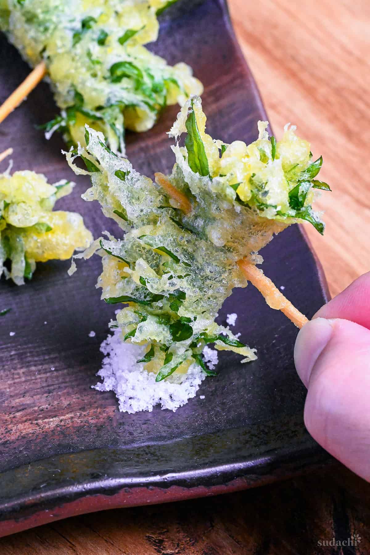 Rolled Ooba (shiso) Tempura on a toothpick