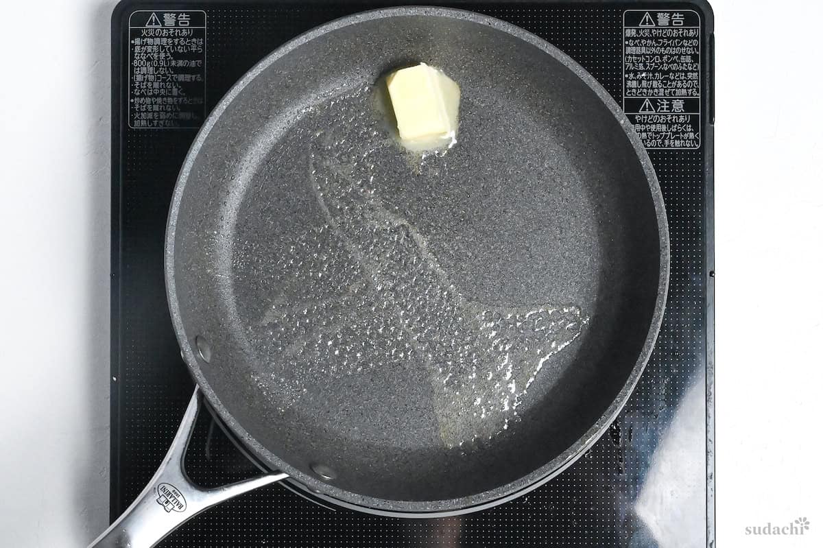 melting butter in a pan on the stovetop