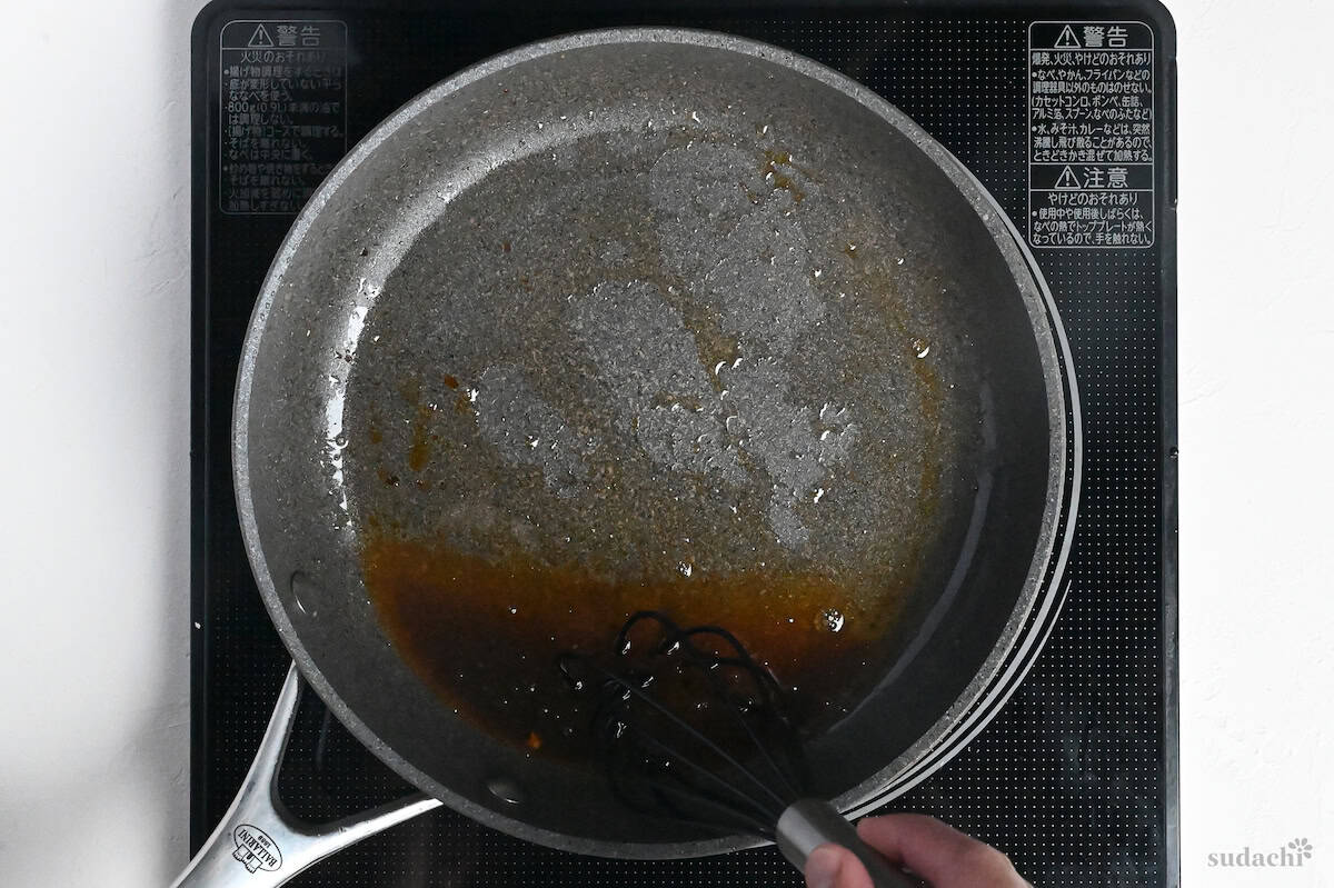 butter soy sauce in a frying pan