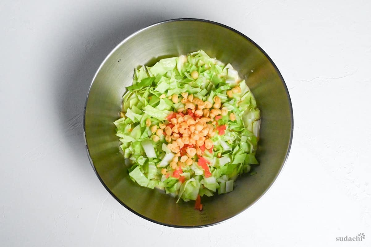 okonomiyaki filling ingredients in a bowl on a white background