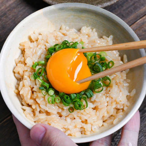 Breaking the egg yolk with chopsticks (Tamago Kake Gohan) thumbnail