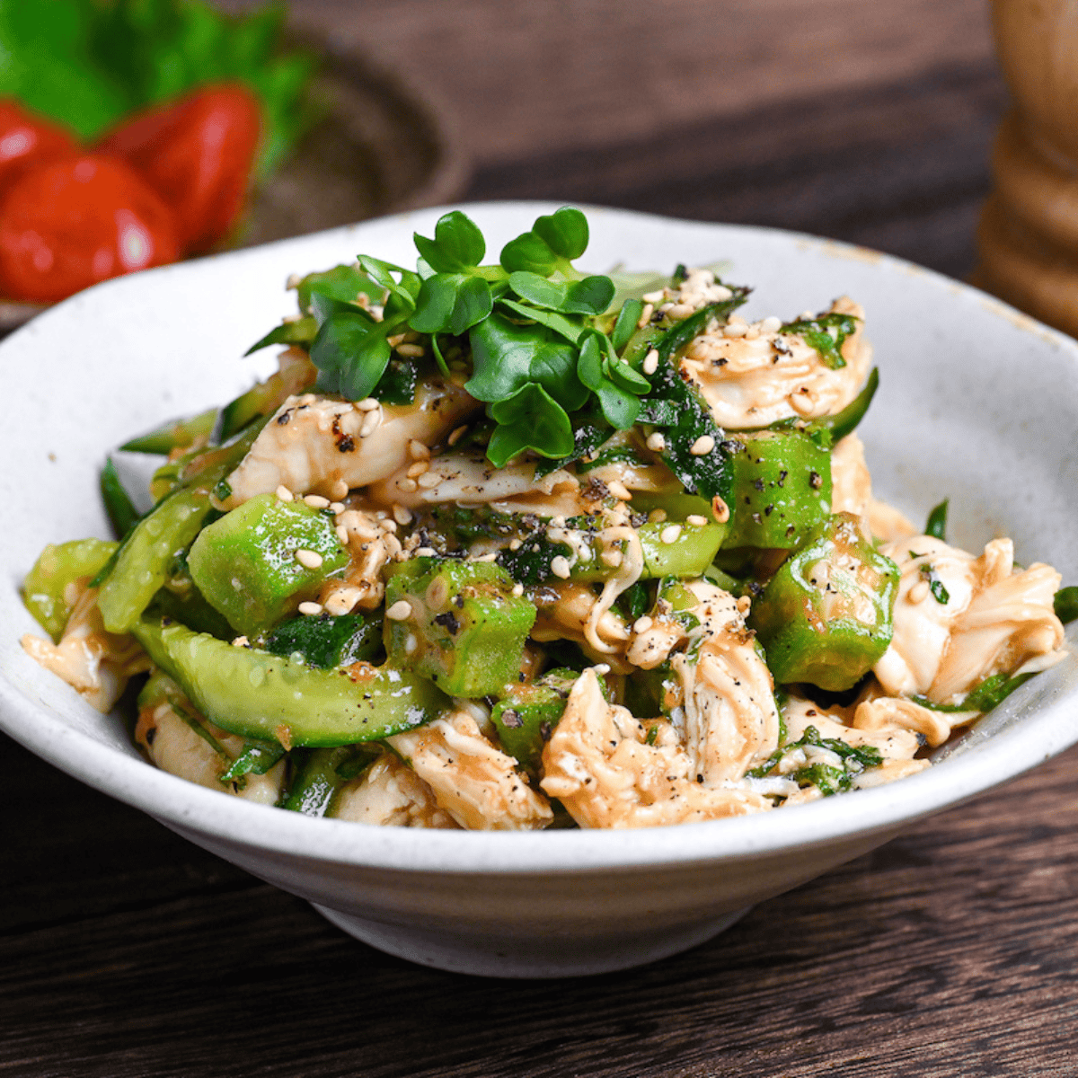 Poached Chicken Tender Salad with Fruity Japanese Style Dressing in a white dish thumb